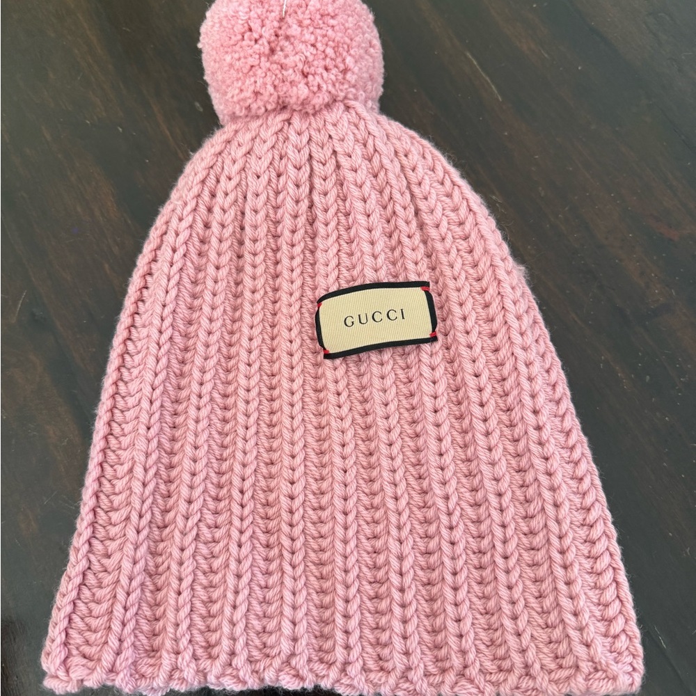 Gucci Kids Pink Knit Beanie with Pom-Pom. I only wore it one time .